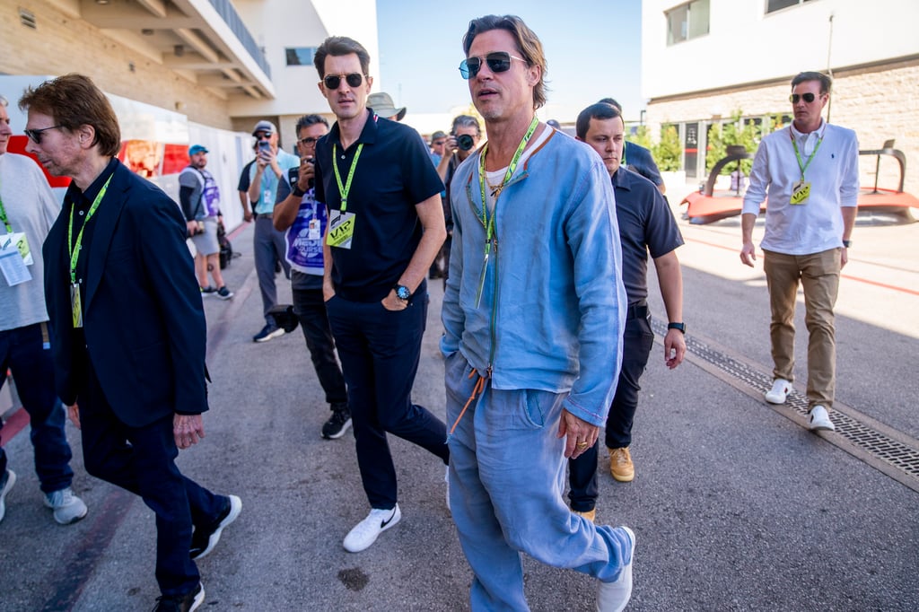 Checo Pérez y la escudería Red Bull reciben la visita de Brad Pitt en