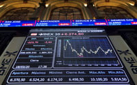 Wall Street abre en rojo y Dow pierde 600 puntos a pesar de estímulo de Fed