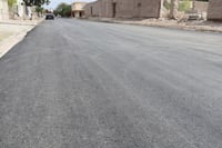 Reparan drenaje y pavimentan vías en San Pedro