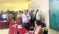 Manifestantes dan portazo en evento de AMLO en Puebla