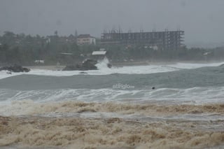 El ciclón Erick, un huracán de categoría tres en la escala de Saffir-Simpson, tocó tierra este jueves por la mañana en el estado de Oaxaca, sur de México