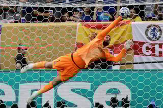 Paris Saint-Germain's goalkeeper Gianluigi Donnarumma saves the ball during the Club World Cup final soccer match between Chelsea and PSG in East Rutherford, N.J., Sunday, July 13, 2025. (AP Photo/Adam Hunger)