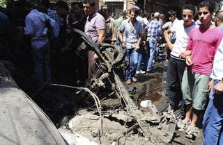 Explosión.Imagen cedida por la Agencia Árabe de Noticias en Siria (SANA) del lugar donde ha tenido lugar una explosión en el suburbio de Jaramana, Damasco.