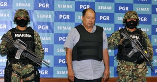 La detención se logró tras una operación de la Marina en Altamira, Tamaulipas, cuando el supuesto capo portaba un arma larga a la entrada de un inmueble. (EFE)