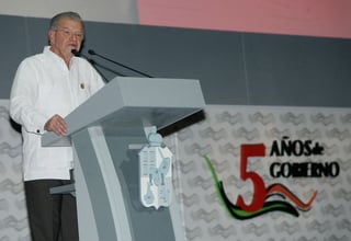 Familiar. El exgobernador de Tabasco,Andrés Granier Melo, durante su Quinto Informe. 