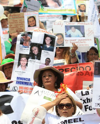 Marcha. Familiares de desaparecidos se manifiestan  durante la Tercera Marcha de la Dignidad Nacional, en Ciudad de México.