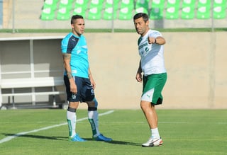 Caixinha y Mauro Cejas durante el entrenamiento de ayer.