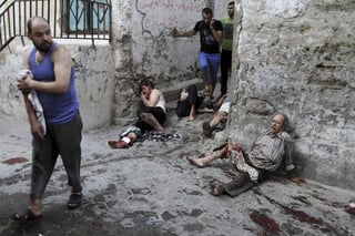 Un mercado y una escuela de la ONU fueron blancos de los bombardeos de Israel en Gaza, donde murieron hoy 93 palestinos. (EFE)