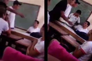 El chico se lanza contra el profesor enfrente del resto del salón. (YouTube)
