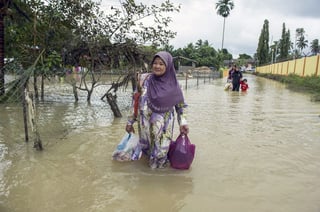Agua. Las lluvias dejaron severas inundaciones en gran parte de Malasia y Tailandia, que están en crisis.