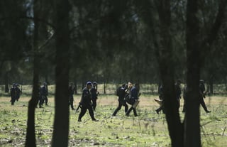 Vigilancia. Imagen de policías federales patrullando la zona de la masacre.