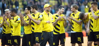 Klopp (centro) dirigirá su último partido en la final de la Copa Alemana. 