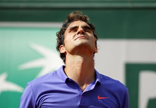 El ex número uno del mundo, Roger Federer perdió 'fácilmente' contra su compatriota Stanistlas Wawrinka en 3 sets. (EFE)