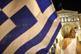 Grecia ha saldado su deuda de 2,000 millones de euros (unos 2,170 millones de dólares) y por lo tanto ya no está 'en mora' con el organismo. (ARCHIVO)