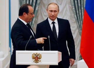 Acuerdo. El presidente ruso, Vladimir Putin (d), y su homólogo francés, Francois Hollande.