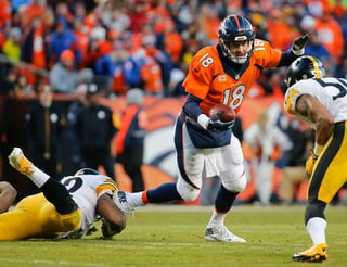 Manning orquestó la ofensiva que terminó en el único touchdown de los Broncos. (AP)