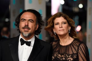 El cineasta mexicano acudió a la gala junto a su esposa Maria Eladia Hagerman. (EFE) 