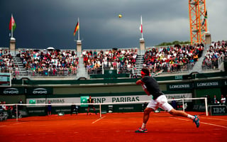 El español, David Ferrer se quejó que los organizadores los obligaran a jugar bajo la lluvia. 