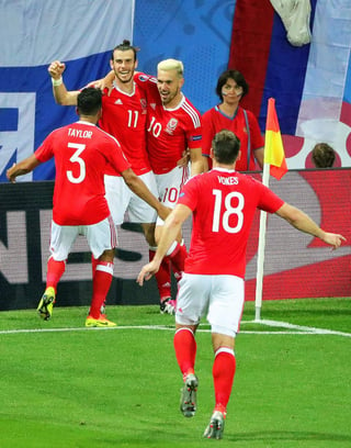 De la mano de Gareth Bale (11) Gales avanzó en primer lugar. (AP)