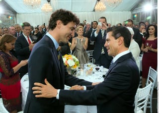 Visita. El primer ministro canadiense, Justin Trudeau (izq.), ofreció ayer en Toronto una cena en honor del presidente Enrique Peña.