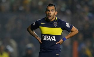 Carlos Tévez pidió a su club tres días de licencia, porque está 'dolorido' tras la eliminación de Boca en la Copa Libertadores. (AP)