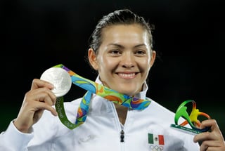 María Espinoza ha conseguido medalla en sus tres participaciones en Juegos Olímpicos. (AP)