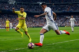 Aunque se lanzó con todo al frente en la segunda mitad, al Real Madrid solo le alcanzó para empatar a un gol con
Villarreal. El mexicano Jonathan dos Santos vio acción durante 88 minutos. (EFE)