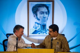 'Le pedimos al Gobierno del presidente Santos, como garantes internacionales que somos y firmantes del acuerdo de paz, que se mantenga el cese al fuego de manera indefinida en Colombia', dijo el presidente venezolano. (ARCHIVO)