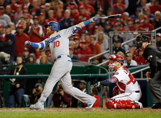 

El jugador Justin Turner sacudió un triplete de dos carreras contra el lanzador Shawn Kelley para poner arriba a los Dodgers en la pizarra. (Fotografía de AP)

