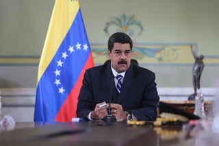 Maduro dijo que el gobierno llevó a la mesa de diálogo una propuesta para que la Asamblea Nacional, de mayoría opositora, 'acate y empiece a trabajar en una agenda positiva para el país'. (ARCHIVO)