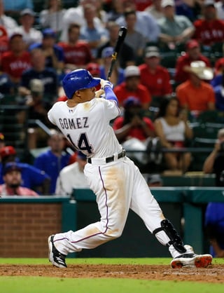 Carlos Gómez bateó .284 con los Rangers de Texas. (AP)   