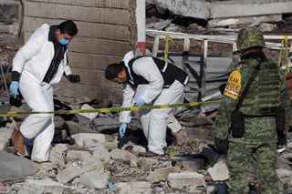 Indagación. Comenzó el peritaje por parte de las autoridades para descubrir las causas de la fatal explosión en Tultepec. 