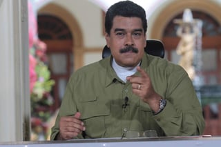 El gobierno del presidente Nicolás Maduro afirmó en una declaración que el anuncio de conversaciones para un posible acuerdo quebranta la palabra empeñada por Santos en 2010 de no concretar una alianza militar con la OT (ARCHIVO)