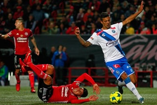 Robert Herrera tuvo un partido para el olvido en la goleada de Xolos ante Puebla. (Jam Media)