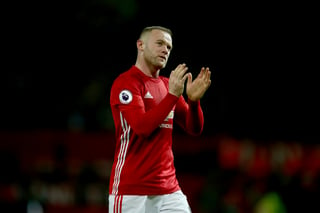 Wayne Rooney le dio el empate al Manchester United en el tiempo de compensación. (Archivo)