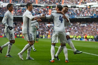 Otra vez con su capitán Sergio Ramos como la figura, Real Madrid venció 2-1 al Málaga.  (Fotografía de AP)