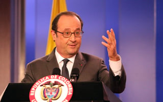 Hollande afirmó que el Acuerdo de Paz con las guerrillas de las FARC es también “un ejemplo para el mundo'. (EFE)