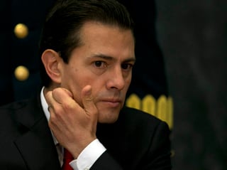 Un sondeo trimestral de Consulta Mitofsky reveló el martes que Peña Nieto tiene un 17 % de aprobación y un 77 % de desaprobación, el nivel más bajo de su gestión. (ARCHIVO)