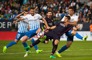 Ahora ni Luis Suárez ni Lionel Messi pudieron evitar la derrota del cuadro azulgrana.  (Fotografía de AP)