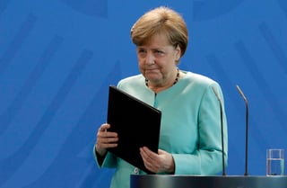 Liderazgo. Ángela Merkel, asumió ayer el liderazgo de la lucha global del cambio climático tras la retirada de Trump. (EFE)