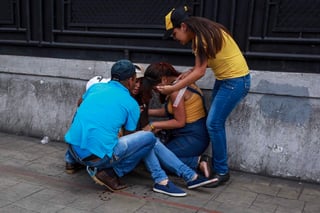 Dos muertos por ataque armado en consulta opositora en Caracas