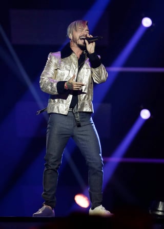Señaló que recientemente J Balvin fue nuevamente el ganador de los Heat Latin Music Awards, recibiendo premios por Video del Año, Artista Masculino del Año y Artista Urbano del Año. (ARCHIVO)