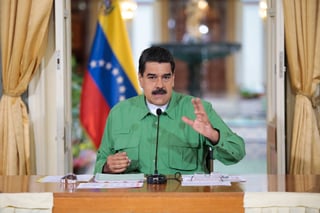 Se enfrentan. El presidente de Venezuela y el canciller Luis Videgaray se enfrentaron ayer verbalmente. (EFE)