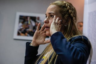 ‘Ilegal’. LilianTintori, esposa del opositor Leopoldo López, dice que tratan de demostrar que hace algo ‘ilegal’. (EFE)