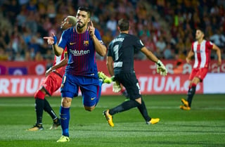 El uruguayo Luis Suárez marcó el tercer tanto del Barcelona en la victoria 3-0 sobre Girona. (EFE) 