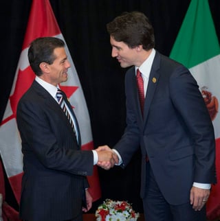 Peña Nieto señaló que Canadá y México 'atraviesan uno de los mejores momentos' de su relación y añadió que están 'presenciando un momento histórico caracterizado por la voluntad de ambos países de fortalecer los lazos y profundizar' su diálogo estratégico. (ARCHIVO) 