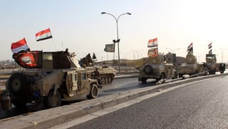 Ayer, las fuerzas iraquíes comenzaron una operación para recuperar el control de los territorios disputados entre los dos gobiernos. (EFE)