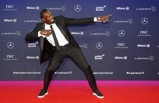 El velocista jamaiquino Usain Bolt insiste en que quiere jugar al futbol. (Archivo)