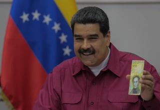 Crisis. El presidente Nicolás Maduro anunció ayer la incorporación del billete de 100,000 bolívares. (EFE)