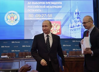 Candidatura. Putin acude personalmente a comisión electoral para inscribir su candidatura. (EFE)